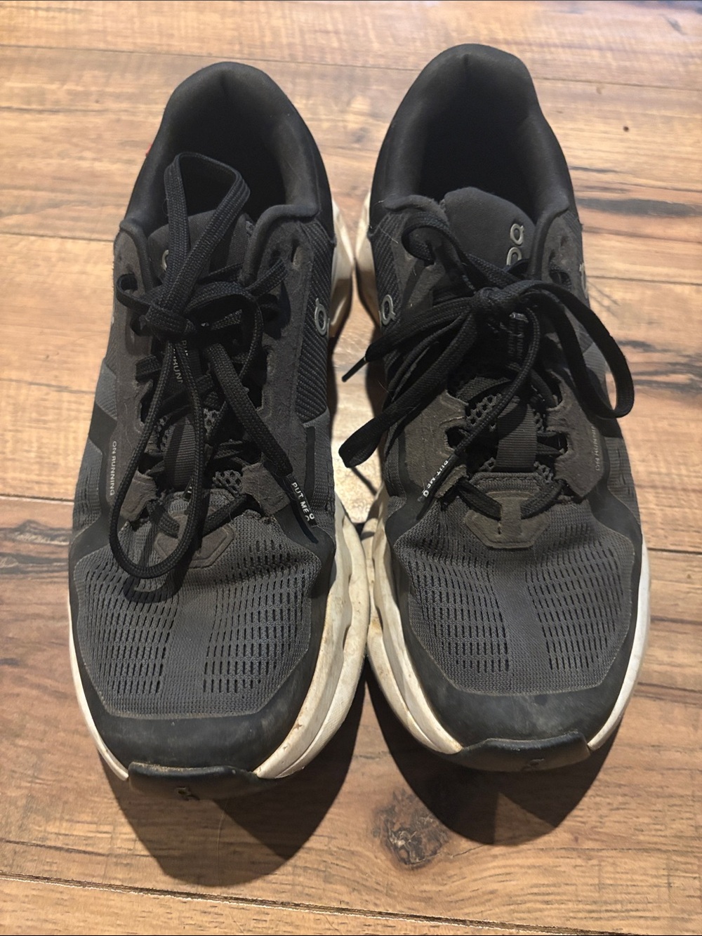 On Running Men's Athletic Sneakers in Black and White